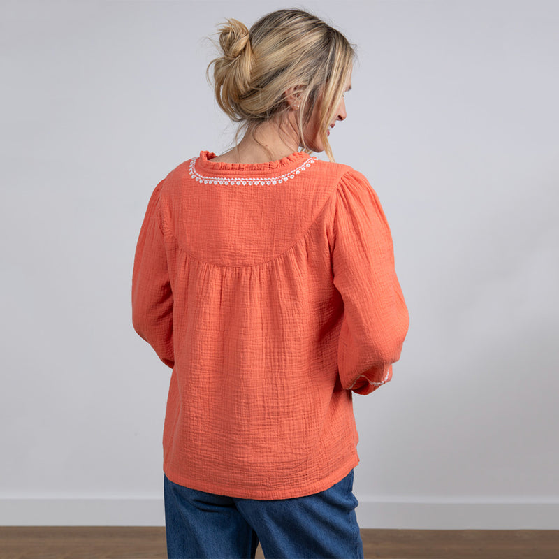 orange long sleeve top